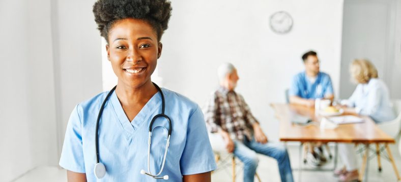 Portrait of a doctor or nurse caregiver with senior woman at home or nursing home