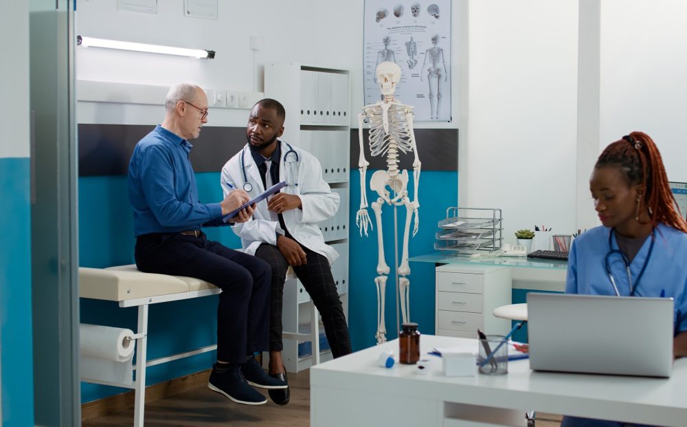 Elderly patient signing medical form at checkup visit with medic, doing healthcare examination to cure disease diagnosis. Using report to sign afte consultation appointment at health facility.