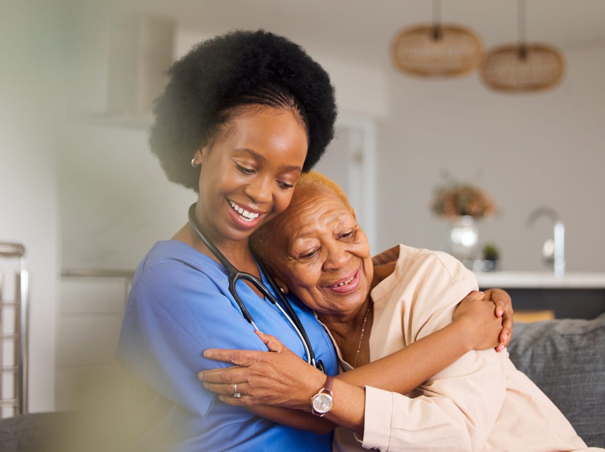 Black people, hug and nurse in elderly care for support, trust or healthcare in old age home. Happy.